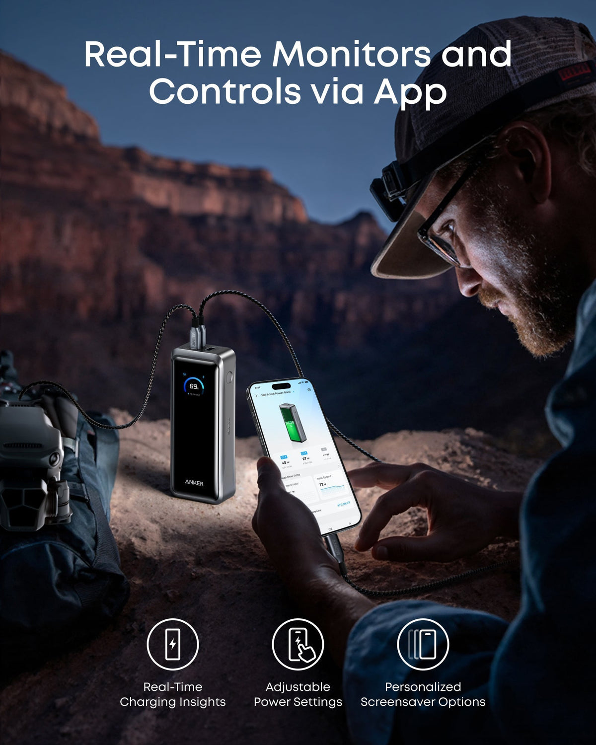 Anker with smartphone for real-time charging insights in outdoor canyon scene